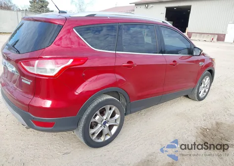 2014 Ford Escape Titanium z USA, uszkodzony, nr VIN 1FMCU0JX4EUE08252